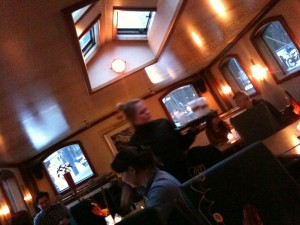 H2O inside a golden boat, slant